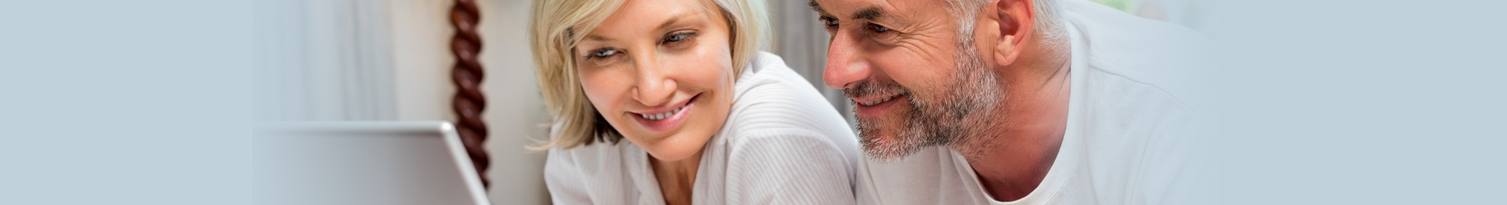 couple using laptop